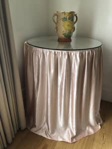 Table with glass top satin table cloth