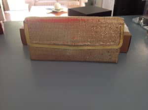 GLO Mesh Hand bag Gold in colour