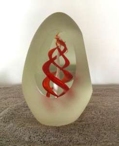 GLASS PAPER WEIGHT WITH RED SWIRLS INSIDE - FROSTED AND CLEAR