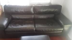 Black leather couch with chase