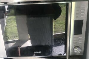 Omega microwave oven model OM301XA