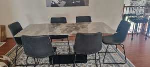 Marble finished dining table chairs