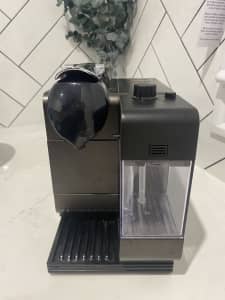 Black DeLonghi Nespresso Coffee Pod Machine