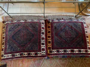 A pair of large tribal Persian/Afghan floor cushions