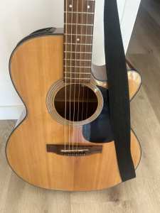 Acoustic electric Takamine guitar