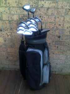 Matched full set of Fila graphite shaft clubs with immaculate bag