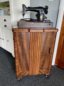 Vintage antique singer sewing machine and cabinet