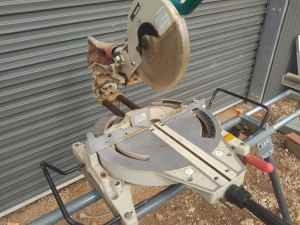 Makita ls1013 slide compound drop saw on stand