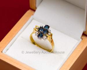 {VALUED @ $2,620} 14CT SAPPHIRE AND DIAMOND RING