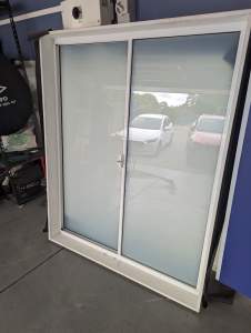 Brand new white window with translucent glass 1500h