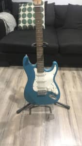Electric Guitar (Teal Coloured)