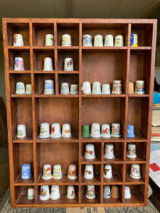 Ceramic thimbles and standThimble collection