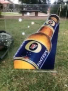 Collectible Fosters beer advertising sign on thick Perspex