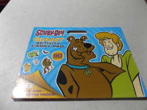 NEW SCOOBY DOO ACTIVITY PAD BOOK HAS LOT OF STICKERS.
