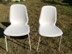 Set of 2 white dining/kitchen chairs from Ikea. With solid metal legs