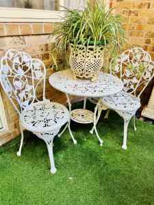 French provincial outdoor setting - a table and 2 chairs