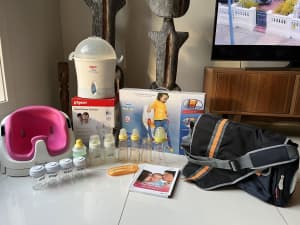 Baby bottles, feed chair, nappy bag, steriliser, toilet training seat