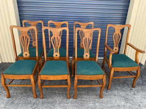 7 Queensland maple dining chairs (includes 1 carver)