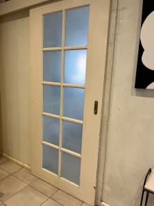Solid glass panel wood door with pelmet
