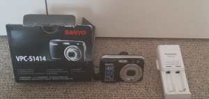 Dvds $100,vPC-S1414 camera, camera bag and recharge $100