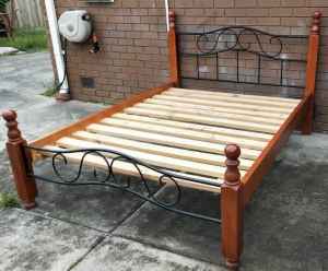 metal and timber frame queen bed with mattress