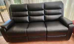 3 seater sofa with electric recliner at each end. Perfect condition.