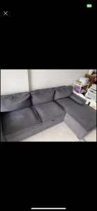 L shaped couch with storage and guest bed