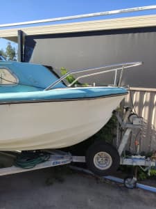 Fibreglass boat with 50 hp motor and trailer, new registration.r 
