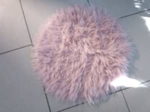 Small pink shagg pile rug