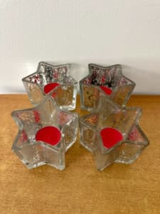 4 QUALITY HEAVY GLASS DECORATIVE STAR TEALIGHT CANDLE HOLDERS.
