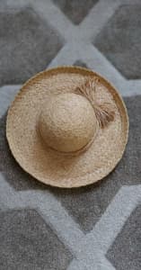 2 natural fibre/straw hats. 1 new with tags. Online garage sale