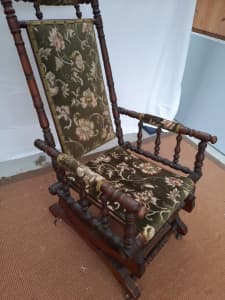 Carved, antique rocking chair.