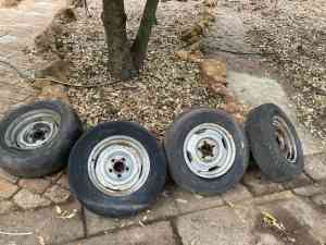 Ford 14 inch stock steel rims and tyres.
