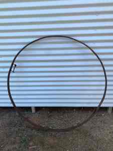 VERY LARGE ANTIQUE STEEL SULKY RIM.