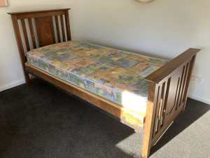 Antique single bed and mattress.