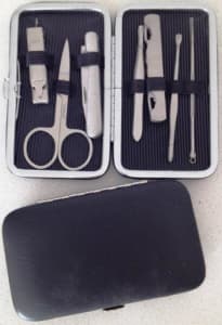 7 piece stainless steel grooming set in leather case