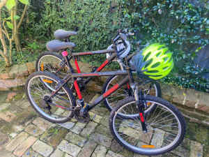 TWO adult push bikes, 18 gears 66cm with helmets