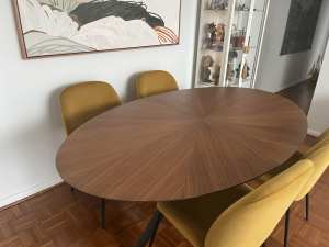 Oval shaped dining table