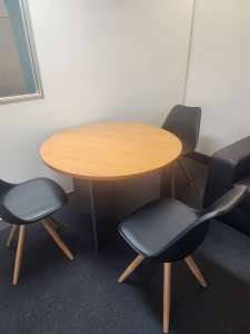 Round office table with chairs