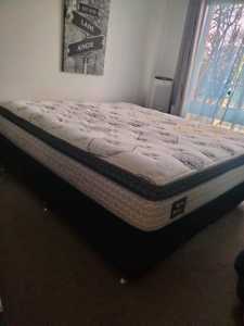 FREE KING COIL BED.