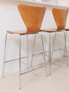 PAIR OF BUTTERFLY STOOLS, In The Style of Fritz Hansen Series 7 Stool.
