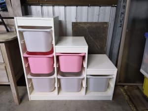 White cabinet with removable plastic drawers