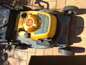 Lawn mower burning oil and smokes good for parts only