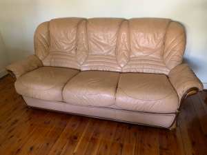 Leather lounge for sale. 3 seater and 2 singles. Good condition. 