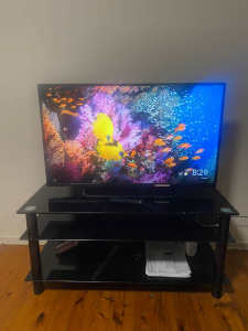 41.5 inch UHD LED LCD TV MODEL GE6993 and TV stand.