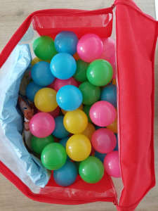 Colorful play balls and the swimming pool