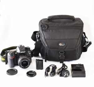 Nikon D7100 DSLR and Nikon 18-55mm Lens / 64GB Card / Bag - S/C 2,534