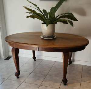 Antique Solid Wood Dining Table with Brass Rolling Feet