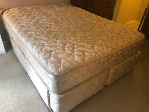 Queen bed with four drawers, Sold.