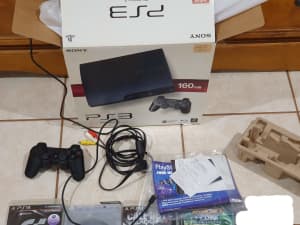 PS3 with Games and Two controllers